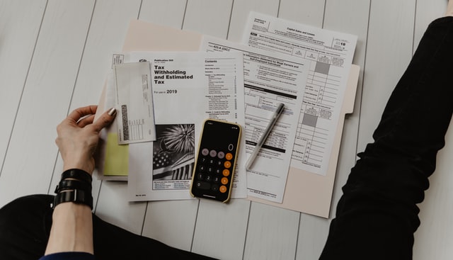 person holding documents