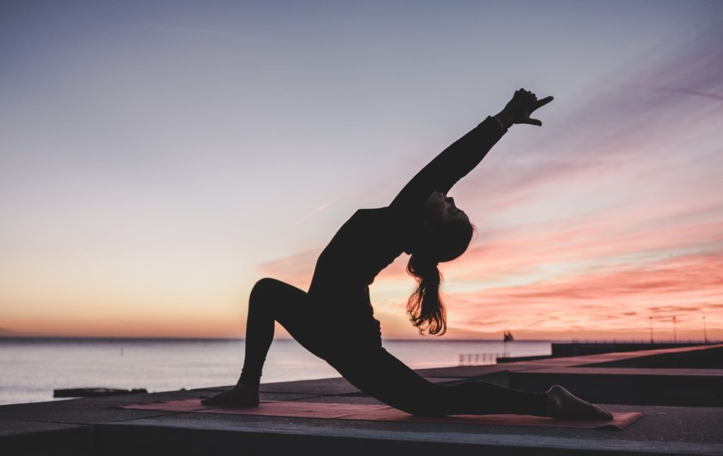 Woman Performing Yoga