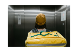 A woman in a home elevator