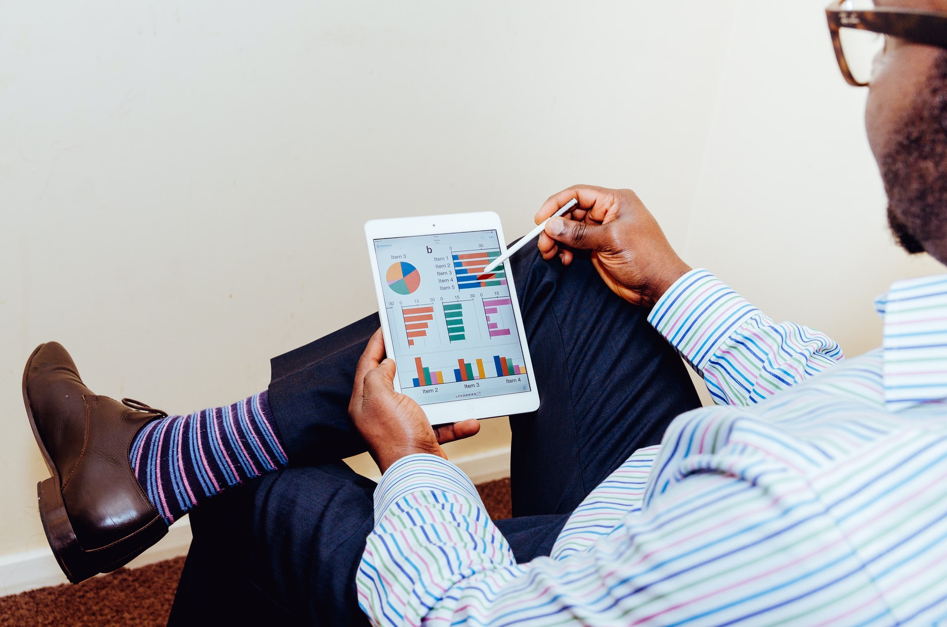 man holding tablet 