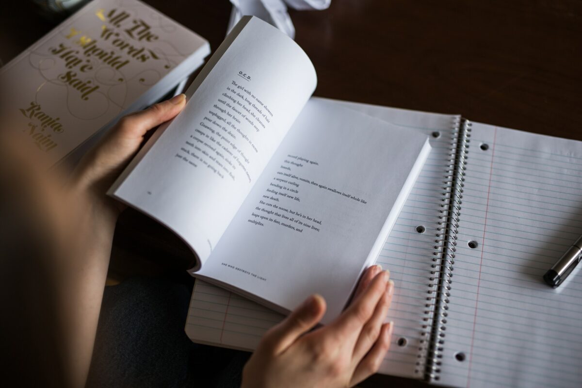 person holding book